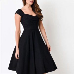 Stop Staring tea length little black dress